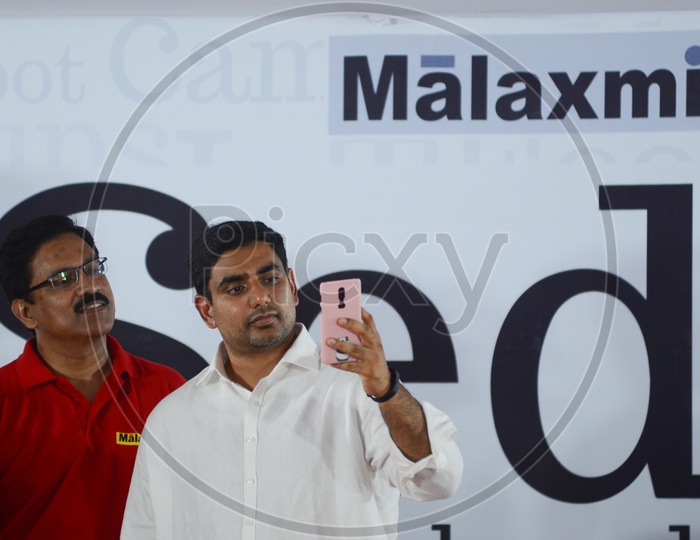 IT Minister Nara Lokesh takes a selfie at Sedibus launching ceremony