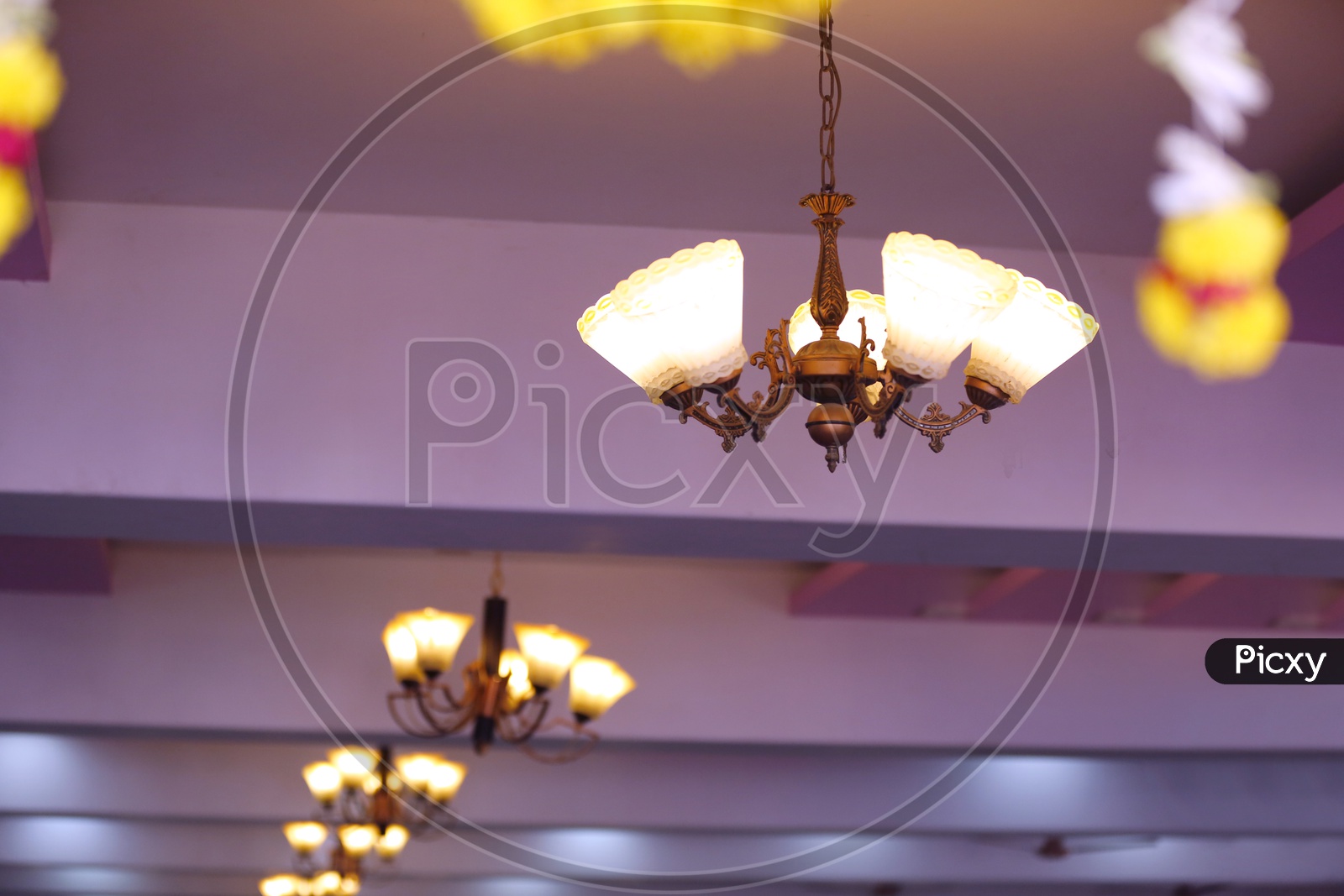 Light Chandeliers in a Wedding Venue