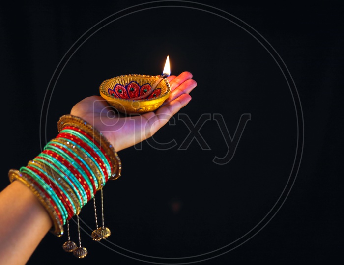 Indian Festival Diwali, Diwali Lamp in Hand