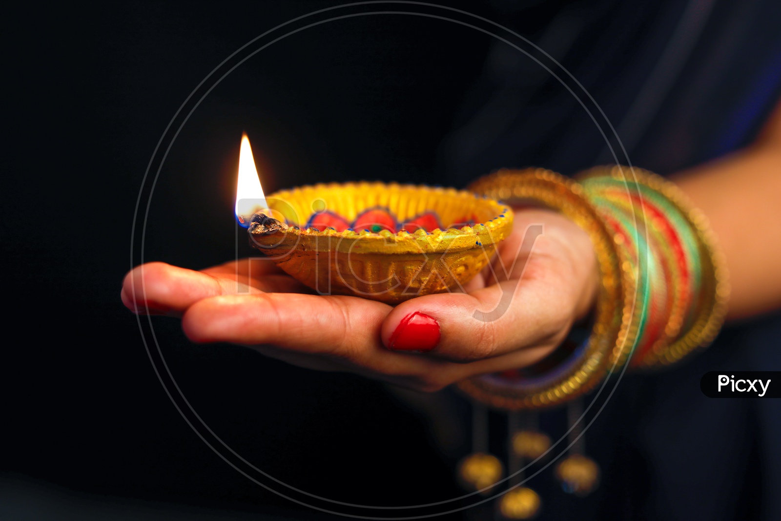 Indian Festival Diwali, Diwali Lamp in Hand