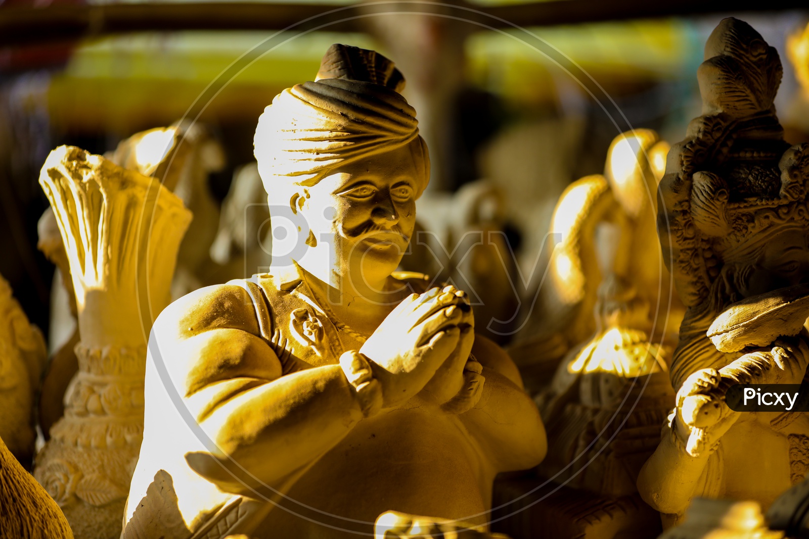 Indian Man Namaste Statue