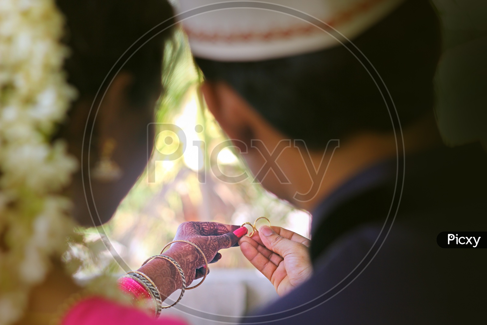 Couple With Their Wedding Rings in Indian Wedding