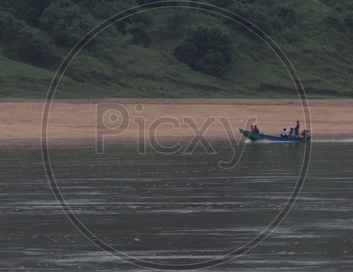 Speed boat sailing on river godavari.