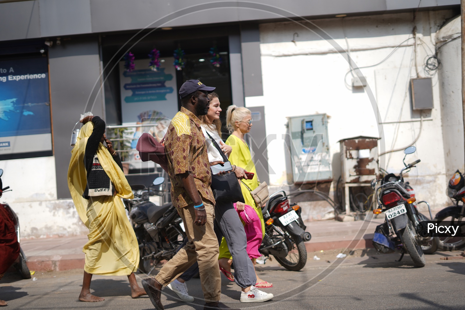 Foreigners Walking Along The Road in Pushkar Streets