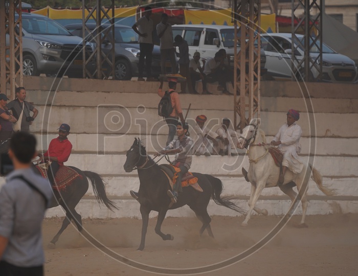 Rajastani Men riding a Horses at Pushkar Camel Fair, 2018