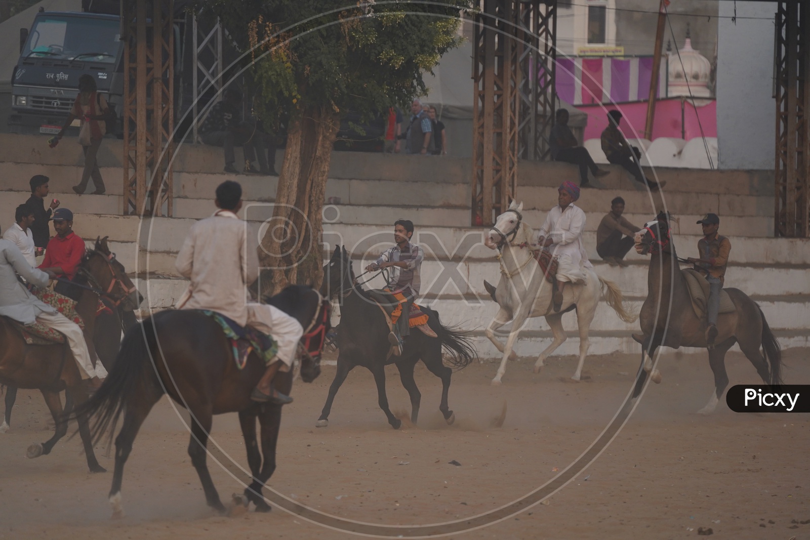 Rajastani Men riding a Horses at Pushkar Camel Fair, 2018