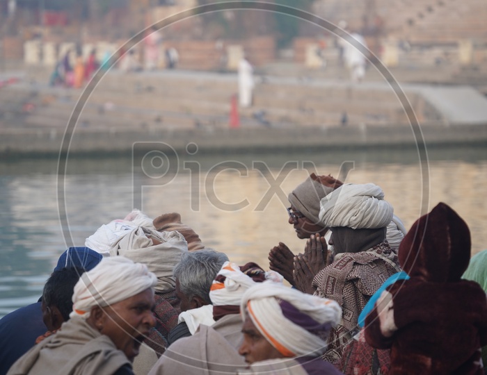 People of Pushkar participating in  pooja at Pushkar Camel Fair
