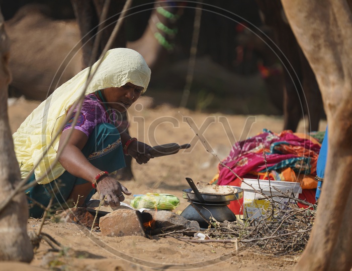 A Woman Making Her Daily Bread / Preparing Food Spotted in Pushkar Camel Fair