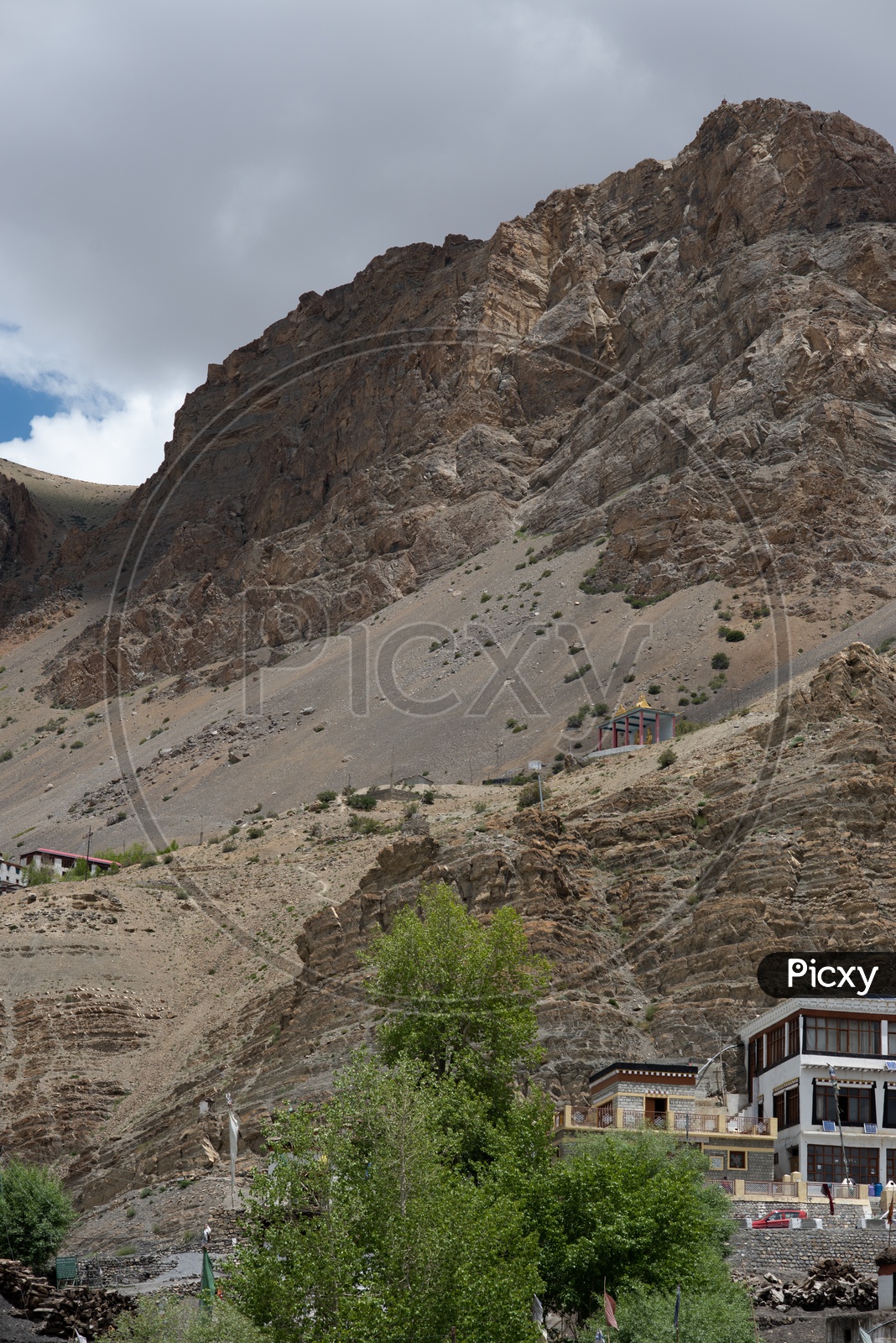 Mountains of Spiti Valley with beautiful clouds and village