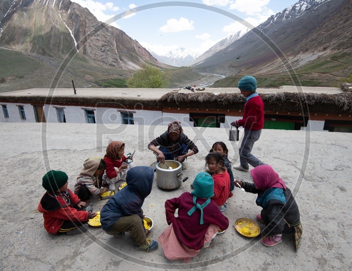 school kids Having Their Lunch  in Leh / ladakh