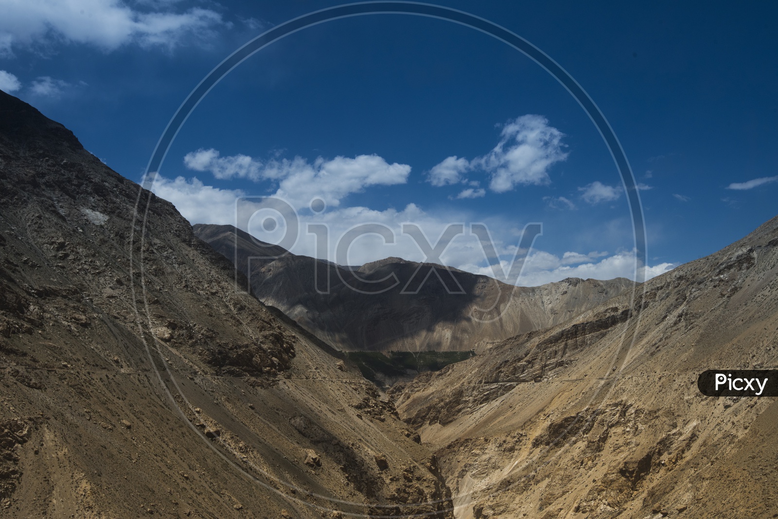A Beautiful River Valley in Leh / Ladakh With sand Dunes and Blue Sky