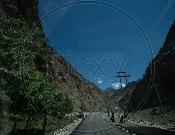 Local Construction Workers Working on Roads Repair  Projects In Leh / Ladakh
