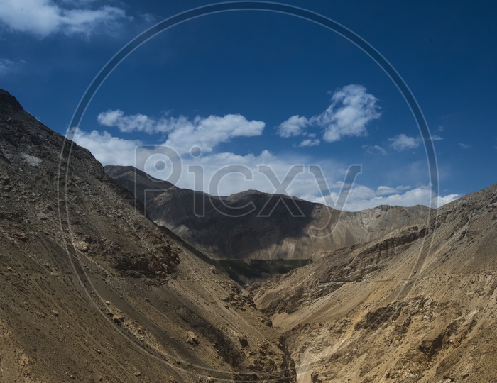 A Beautiful River Valley in Leh / Ladakh With sand Dunes and Blue Sky