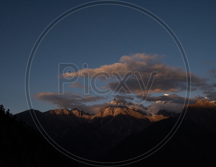 A Beautiful View Of Mountains In Leh / Ladakh With Golden Sunlight Falling on Them
