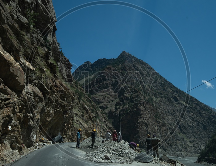 Local Construction Workers Working on Roads Repair  Projects In Leh / Ladakh