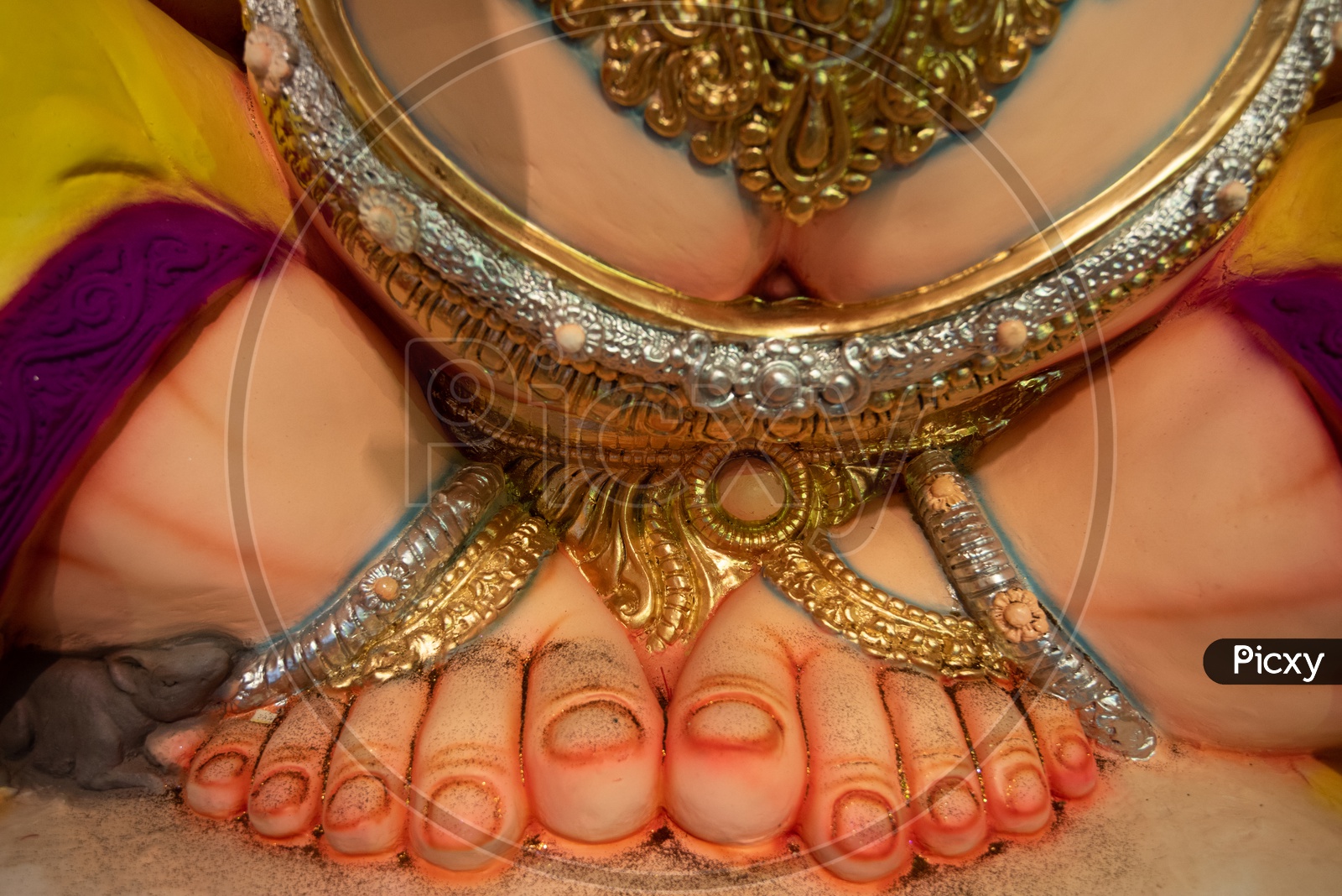 Indian Hindu God Ganesh idol Closeup Shot Presenting The Feet  Of Elephant Headed God