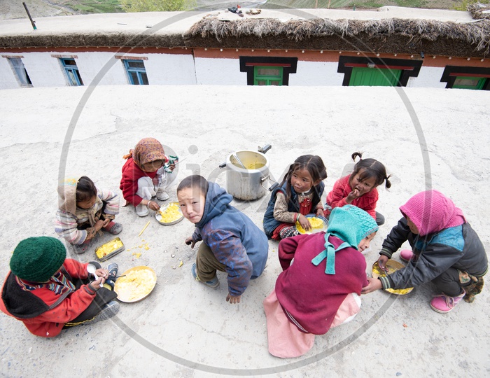 Little kids having their food ,Spiti Valley