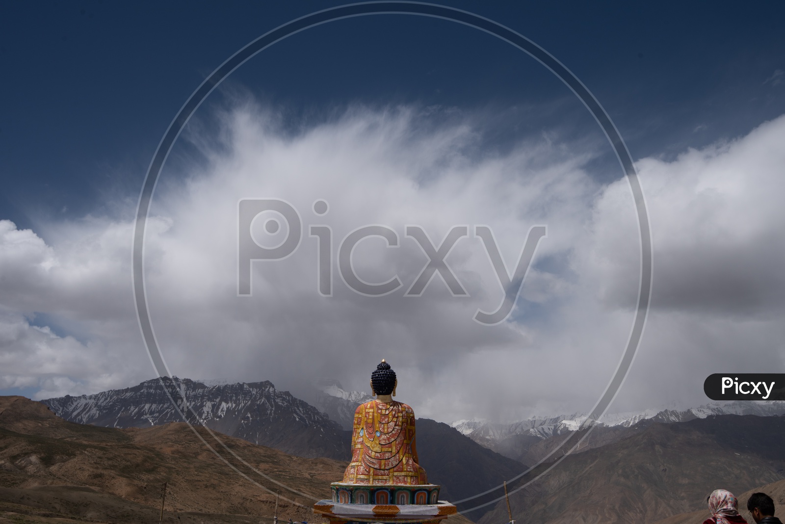 Buddha Statue and beautiful Dunes in BackDrop with Sky and Clouds