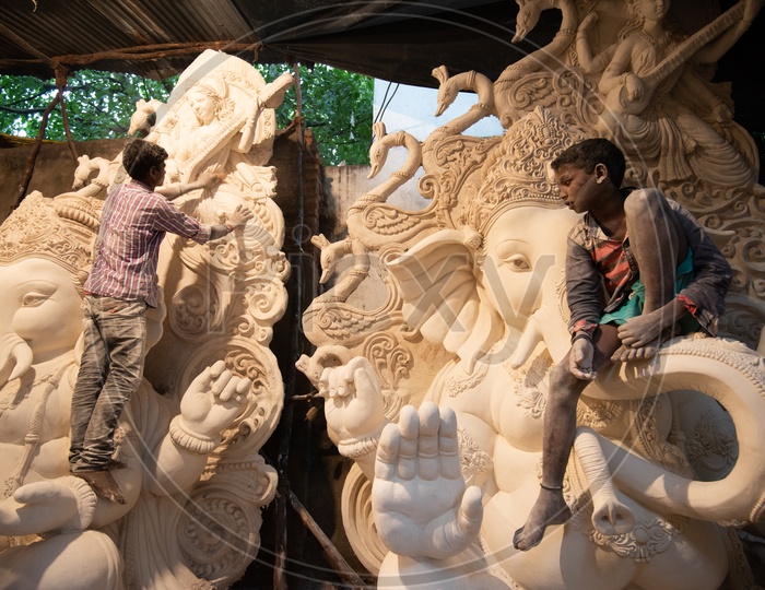 Small boy Making Ganesh/Vigneshwara/Vinnayaka Idols