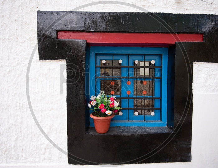 A Window With a flower Pot in Leh / Ladakh