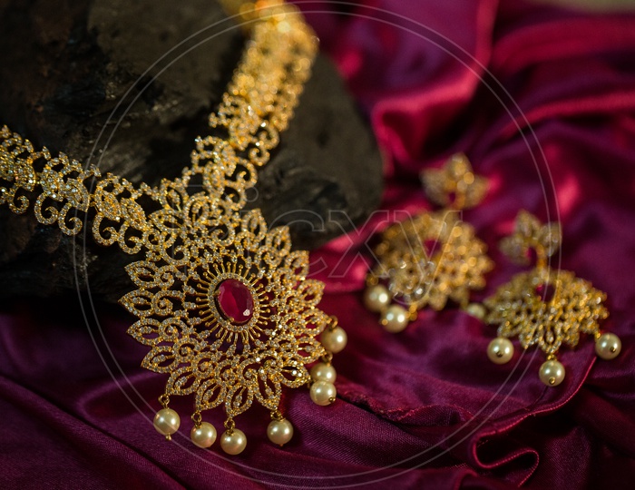 Indian Made Gold Jewellery  Necklace with Ear Ring  Set   Closeup Shot