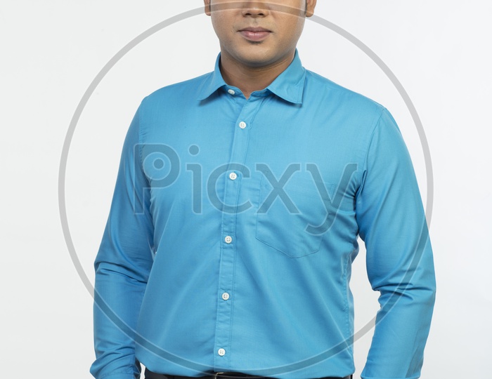 Indian Man in Blue Formal Wear on an Isolated White Background