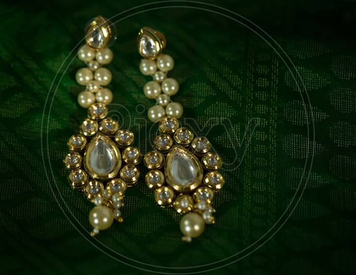 Indian Made Ear Ring Set With Diamond Stones and Pearl in Middle of the Design