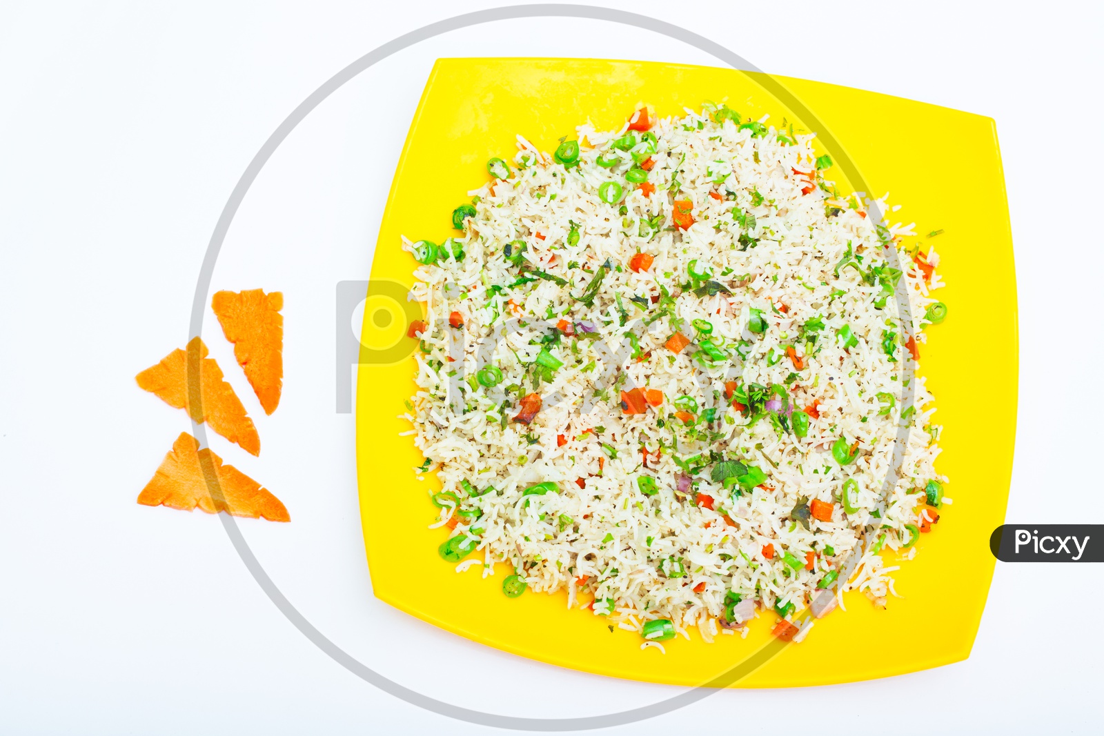 Indian Vegitable Fried Rice in a Plate Presentation Composition Shot With White Background