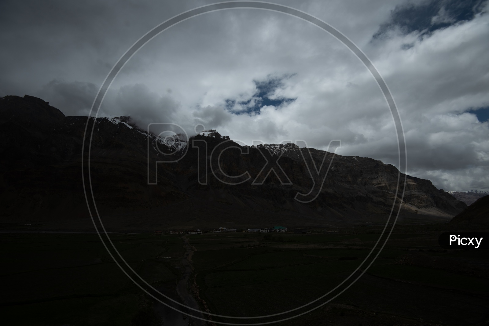 Villages in valleys of Leh / Ladakh  with Mountains in background and  Sky