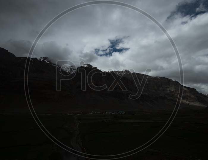 Villages in valleys of Leh / Ladakh  with Mountains in background and  Sky