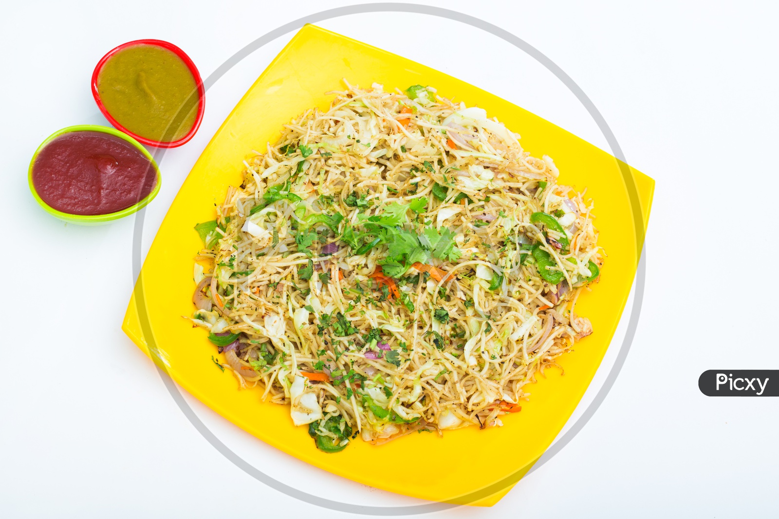 Indo - Chineese  Recipe  Noodles Presenting in a Plate  Composition Shot With White Background