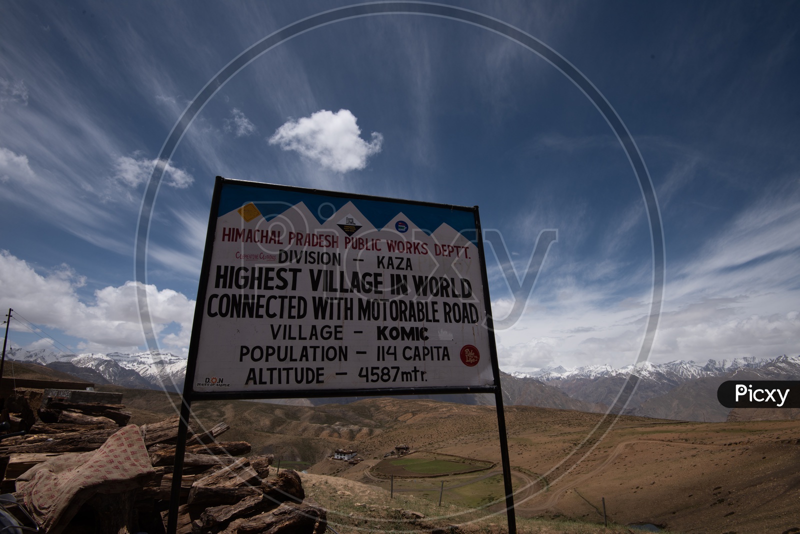 A Sign Board Saying the Worlds Highest Village