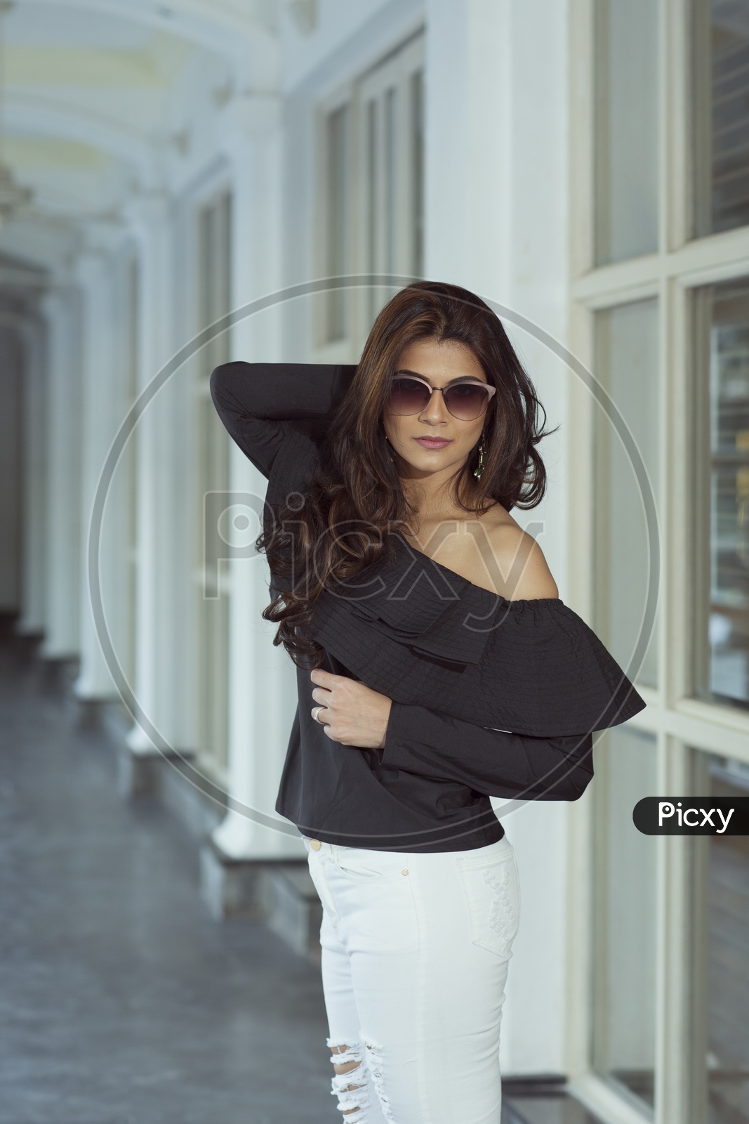 Young Indian Female Model in Modern Dress with Stylish Sun Glasses