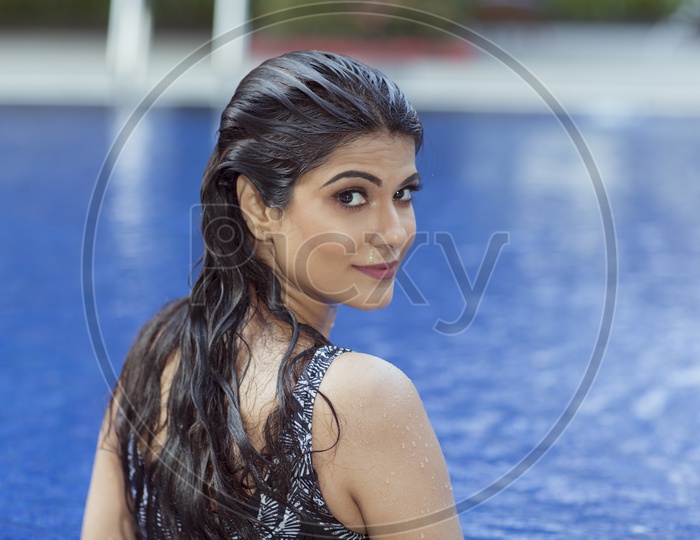 Indian Female Model in Swim suit near Swimming Pool