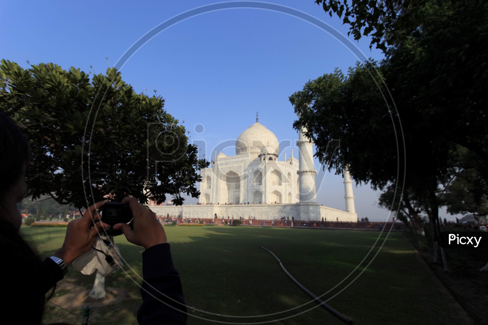 Photographer clicking Taj Mahal Taj Mahal