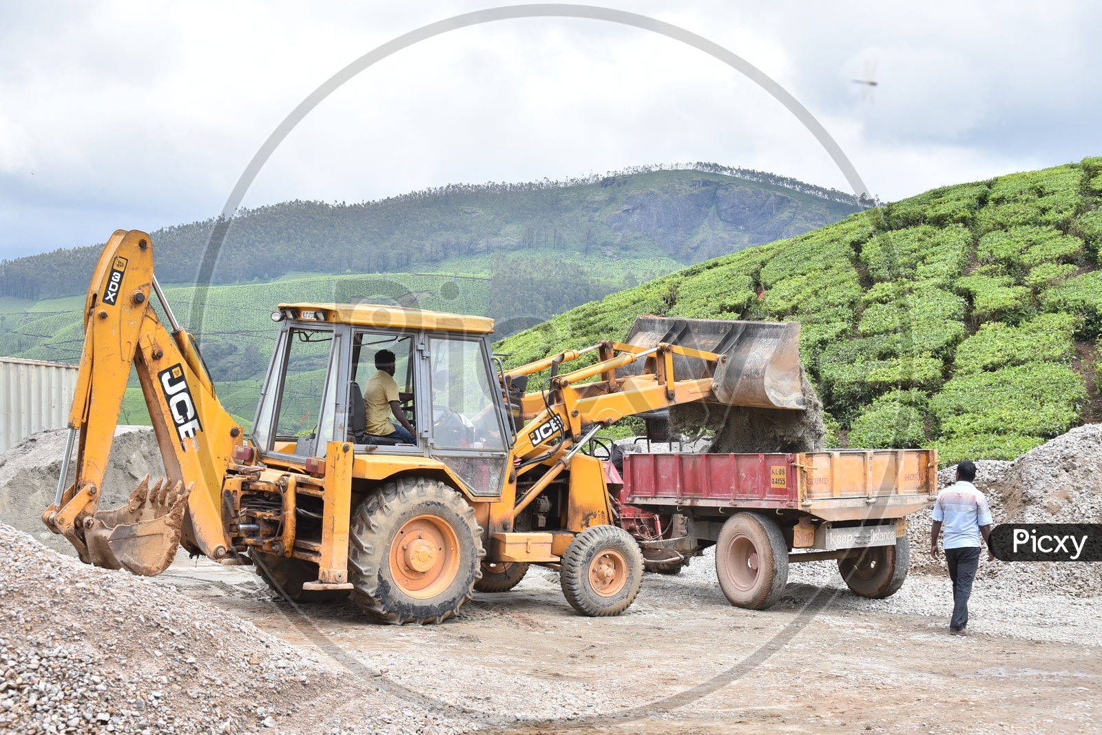 Earth movers / JCB  Working in Road Construction Works In Munnar