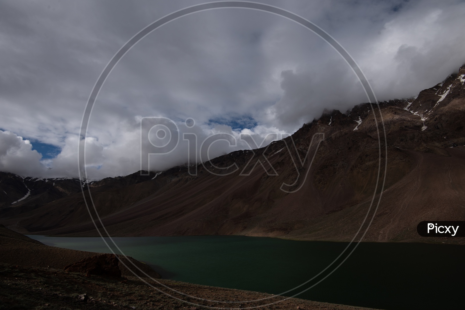 River Valleys In Leh / Ladakh With Mountains In Background and Clouds in Sky