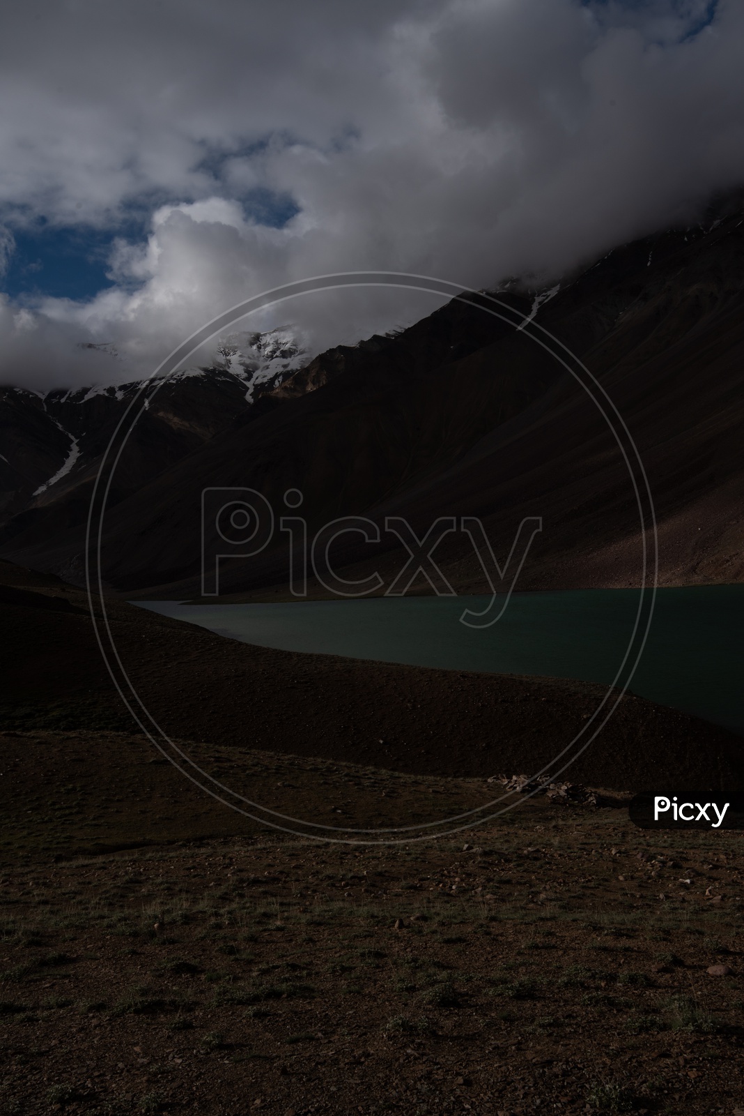 River Valleys In Leh / Ladakh With Mountains In Background and Clouds in Sky