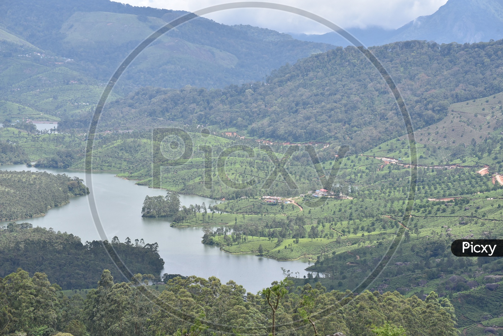 Beautiful Landscape of Munnar mountains with river flowing from the center