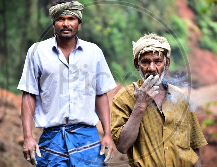 Local Workers in Munnar Smoking Beedi and Looking to Camera