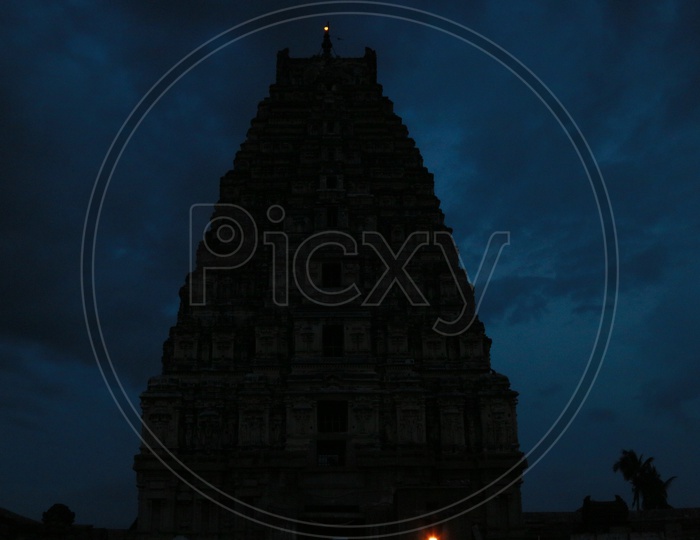 A Silhouette Of a South Indian Temple Shrine in a Bluehour Sky