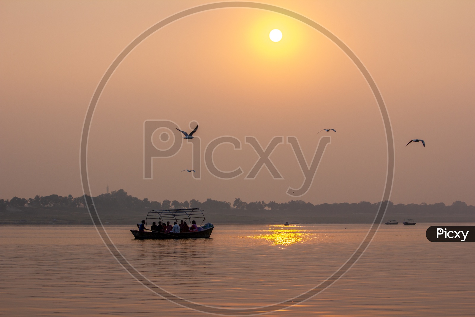 Boats sailing in Triveni Sangam River