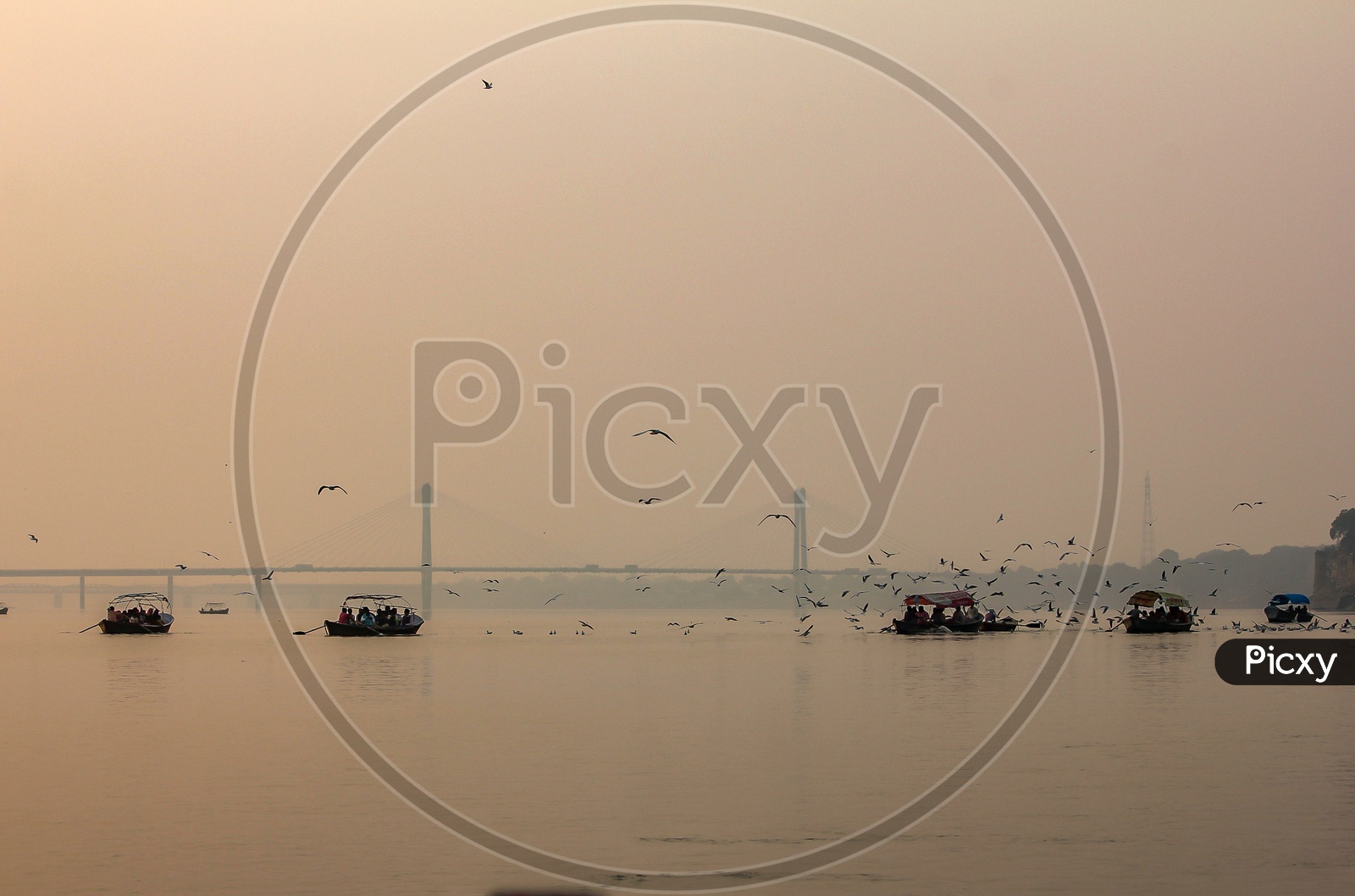 Boats sailing in Triveni Sangam River
