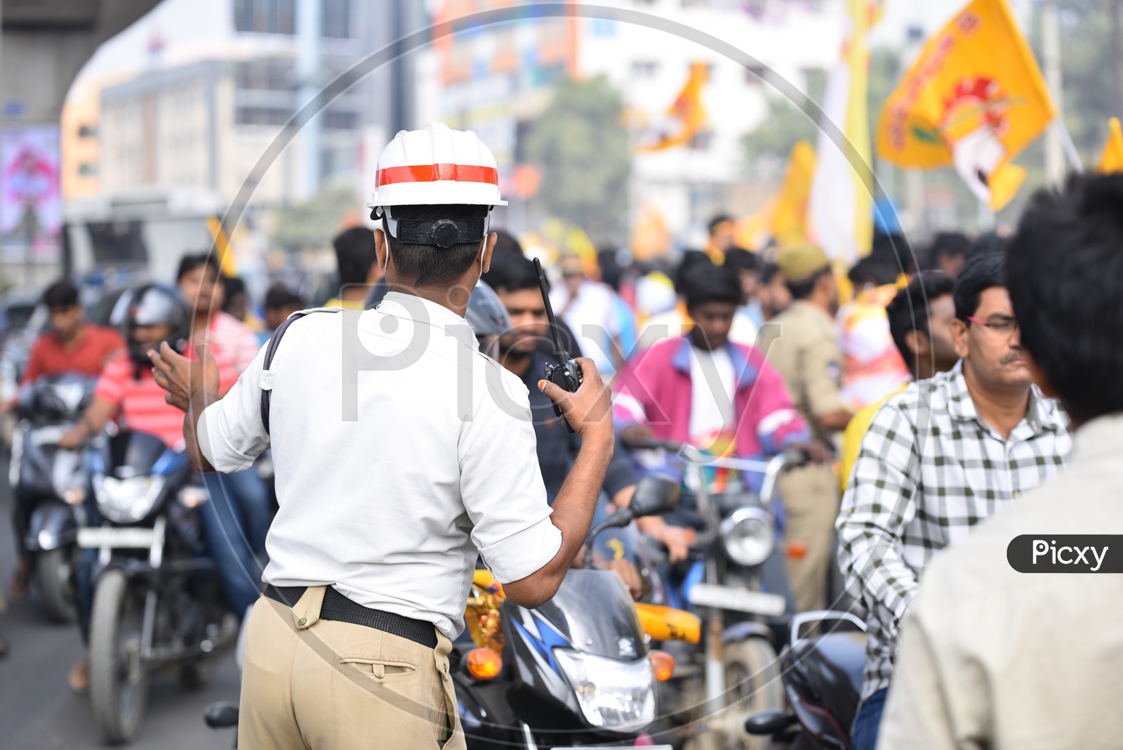 A Traffic Police Giving Directions While a Bike Rally by Telangana TDP