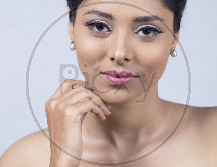 Indian smiling Female Model with White pearl Earrings