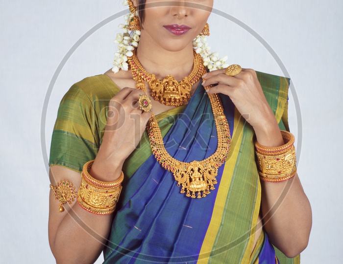 Traditional Indian Female/Woman Model in Blue Saree, green Blouse - Smiling