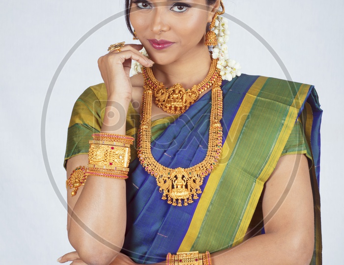 Traditional Indian Female/Woman Model in Blue Saree, green Blouse - Posing