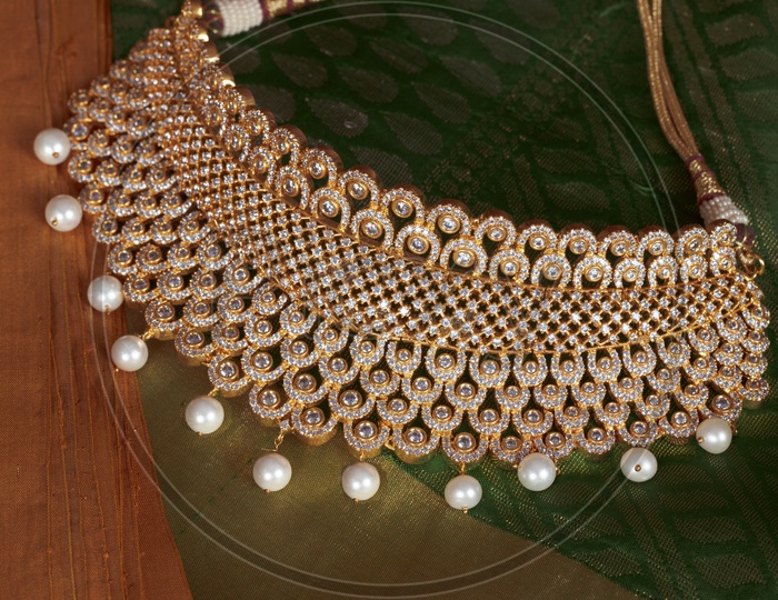 Choker Necklace In Green background - Indian Jewelry/Gold Ornament with White Pearls