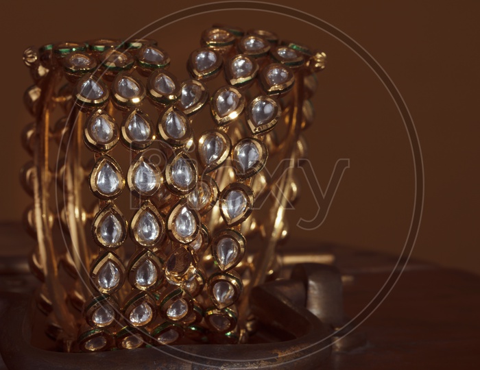 Diamond  Bangles Set  / Jewelry Closeup Shot on an Wooden Background