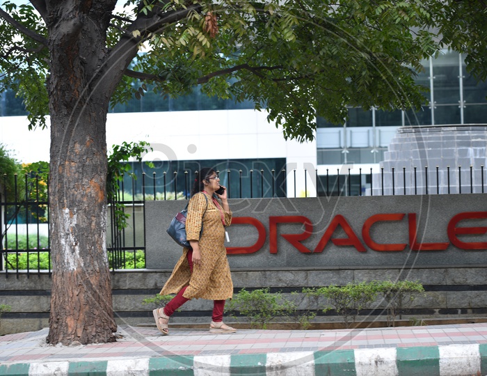 IT Employees Walking in Foothpath at Oracle Office